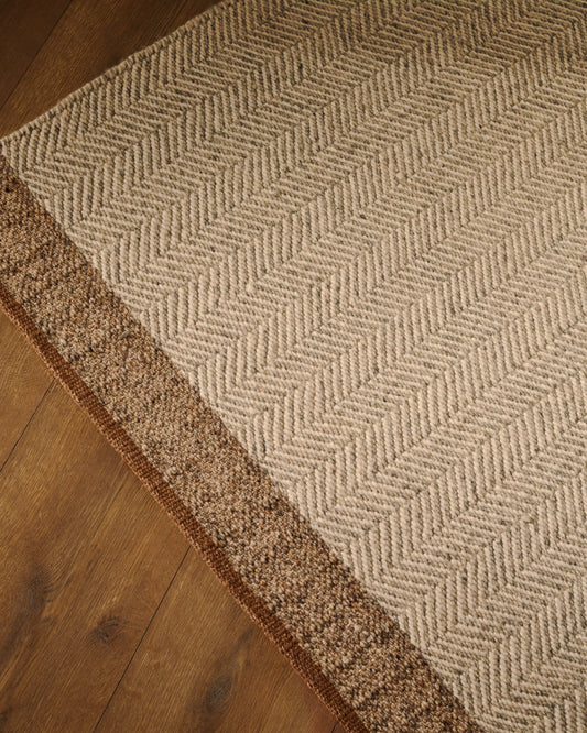 Tapis Nifelia jacquard en laine beige 200 x 300 cm
