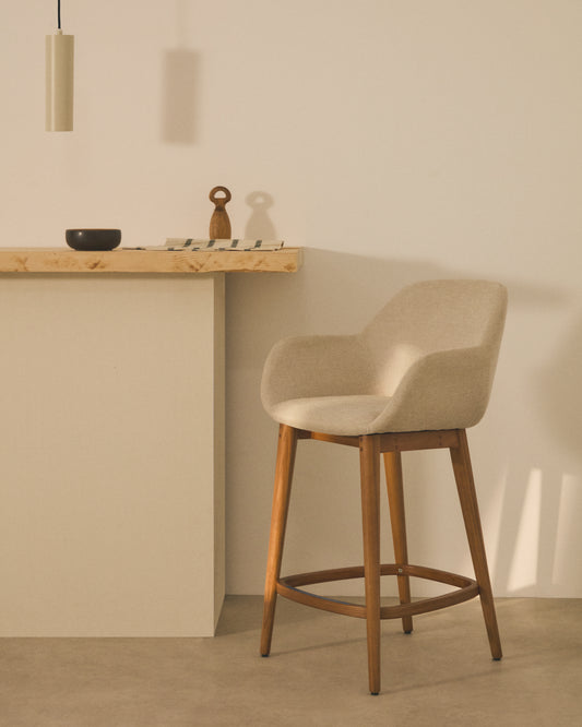 Tabouret Konna beige et pieds en bois de frêne finition foncée 65 cm