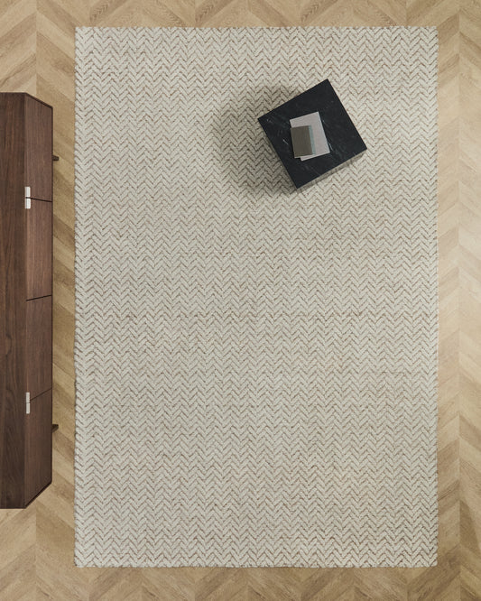 Tapis Calira en laine jacquard à motif tressé beige 300 x 200 cm