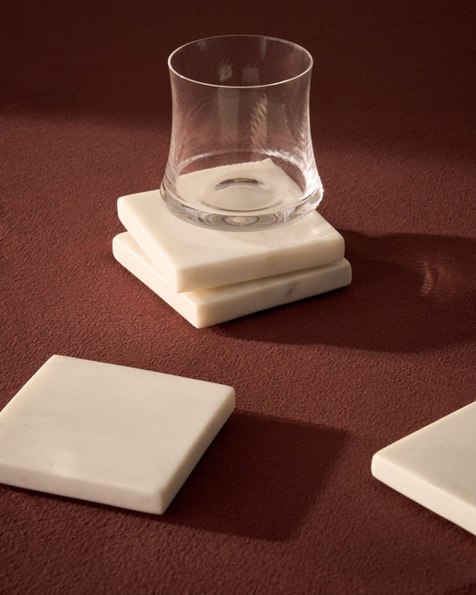 Ensemble Coreni de 4 sous-verres en marbre blanc