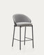 Tabouret Eamy en tissu chenille gris clair placage de frêne finition noire et métal noir hauteur 65 cm