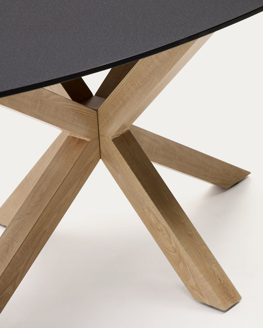 Table ovale Argo en verre noir mat et pieds en acier effet bois Ø 200 x 100 cm